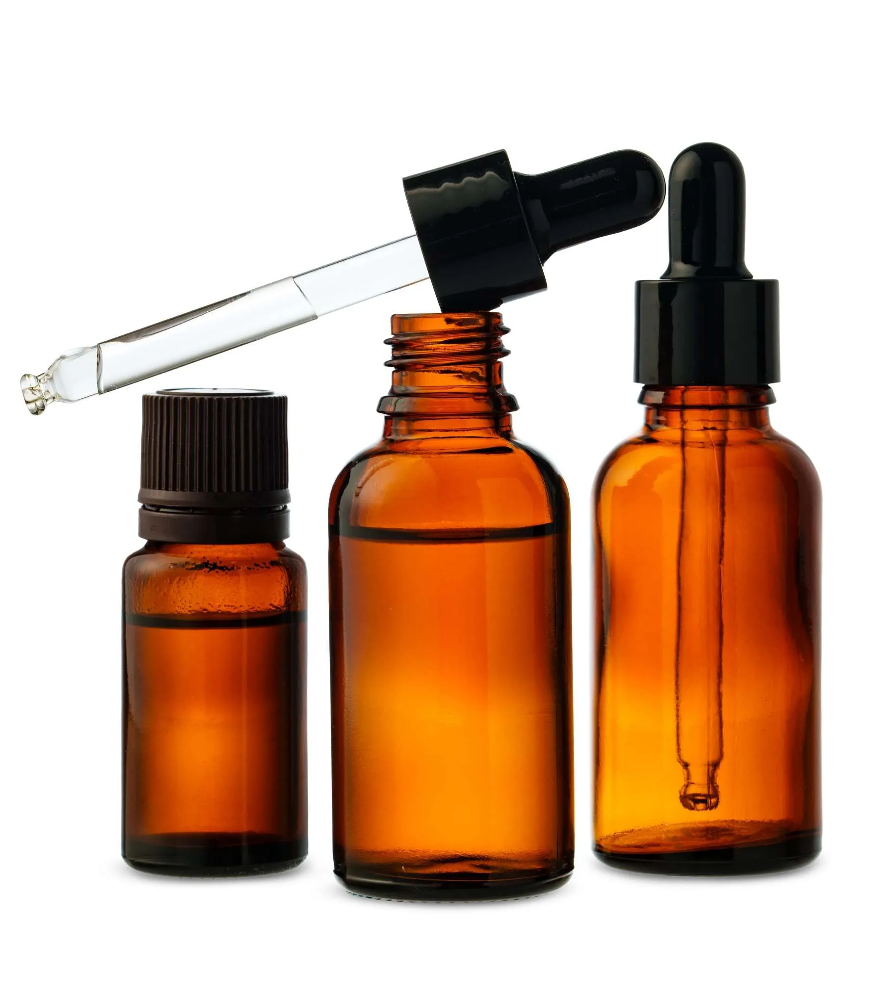 Three Amber Glass Dropper Bottles With Dropper Against White Background